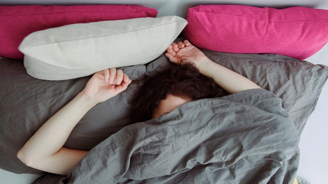 rsz woman sleeping asleep alone bed 1296x728 header 1296x728 1